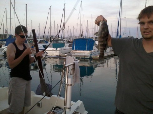 Cole catching a fish